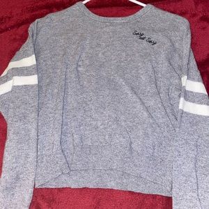 Grey and white “Sorry, not sorry” long sleeve shirt from Forever21. Never worn.